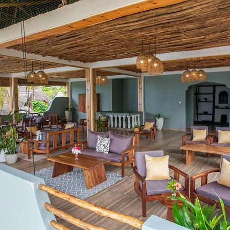 Mnana Beach Bungalows Pingwe Extérieur photo