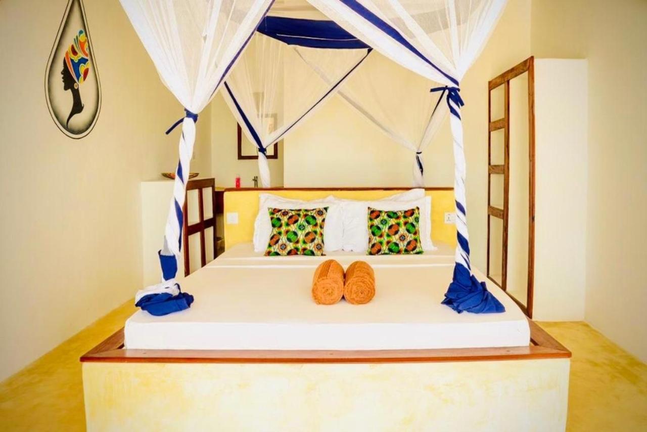 Mnana Beach Bungalows Pingwe Extérieur photo