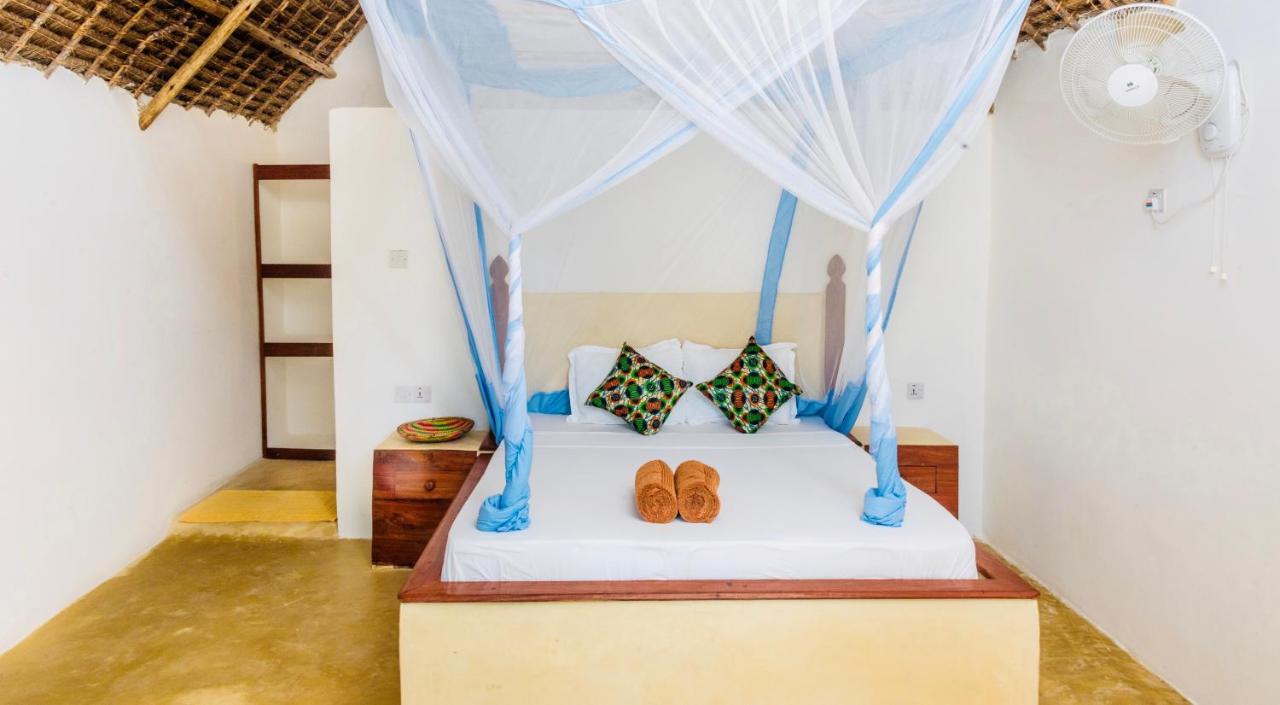 Mnana Beach Bungalows Pingwe Extérieur photo