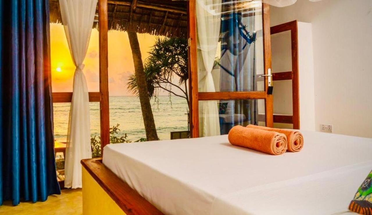 Mnana Beach Bungalows Pingwe Extérieur photo