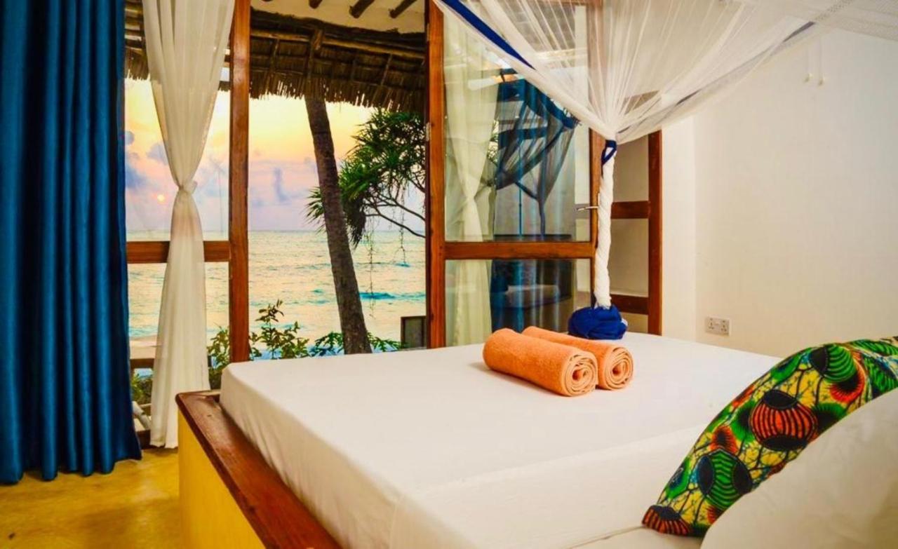 Mnana Beach Bungalows Pingwe Extérieur photo