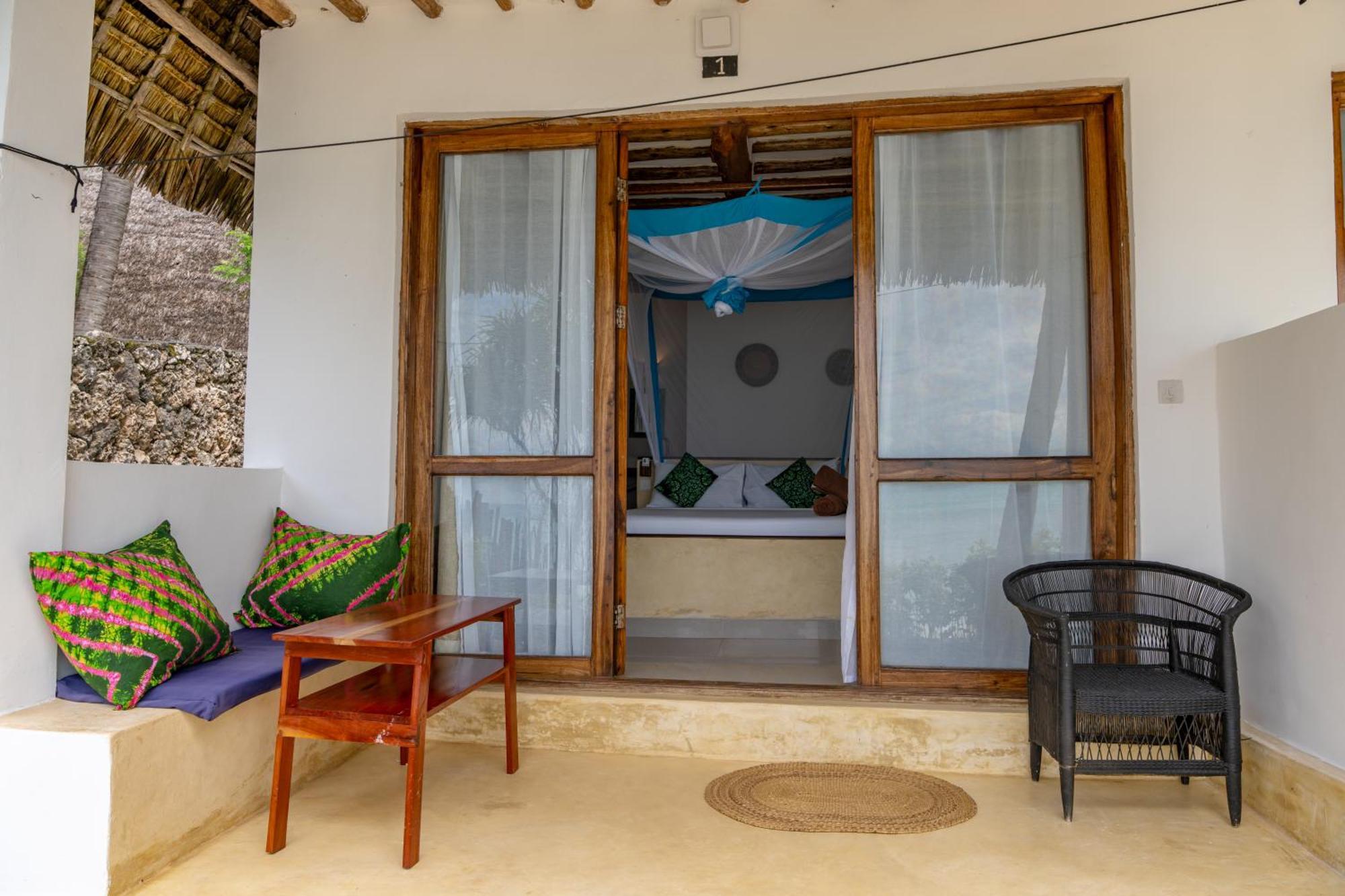 Mnana Beach Bungalows Pingwe Extérieur photo